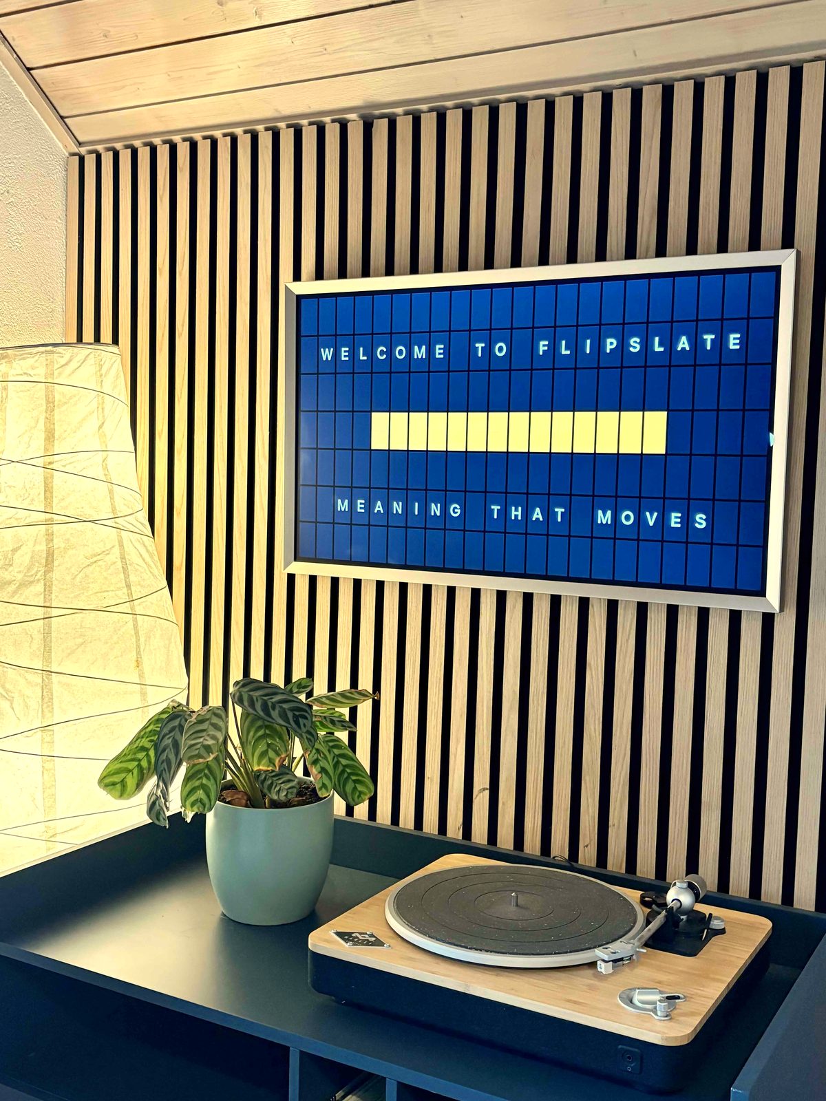 Flipslate running on a wall-mounted TV in a living room